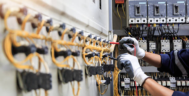 Professional Electrician technician working in Cochituate, MA